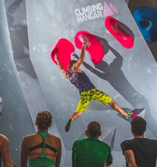 A group of friends bouldering at The Climbing Hangar