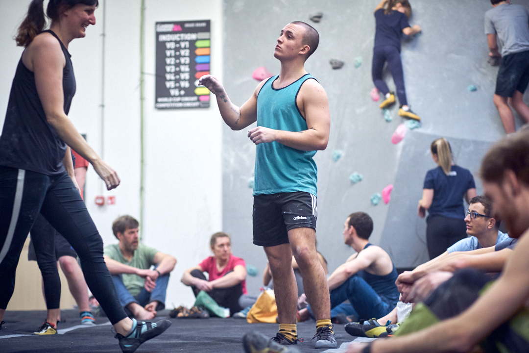 A crowded climbing gym