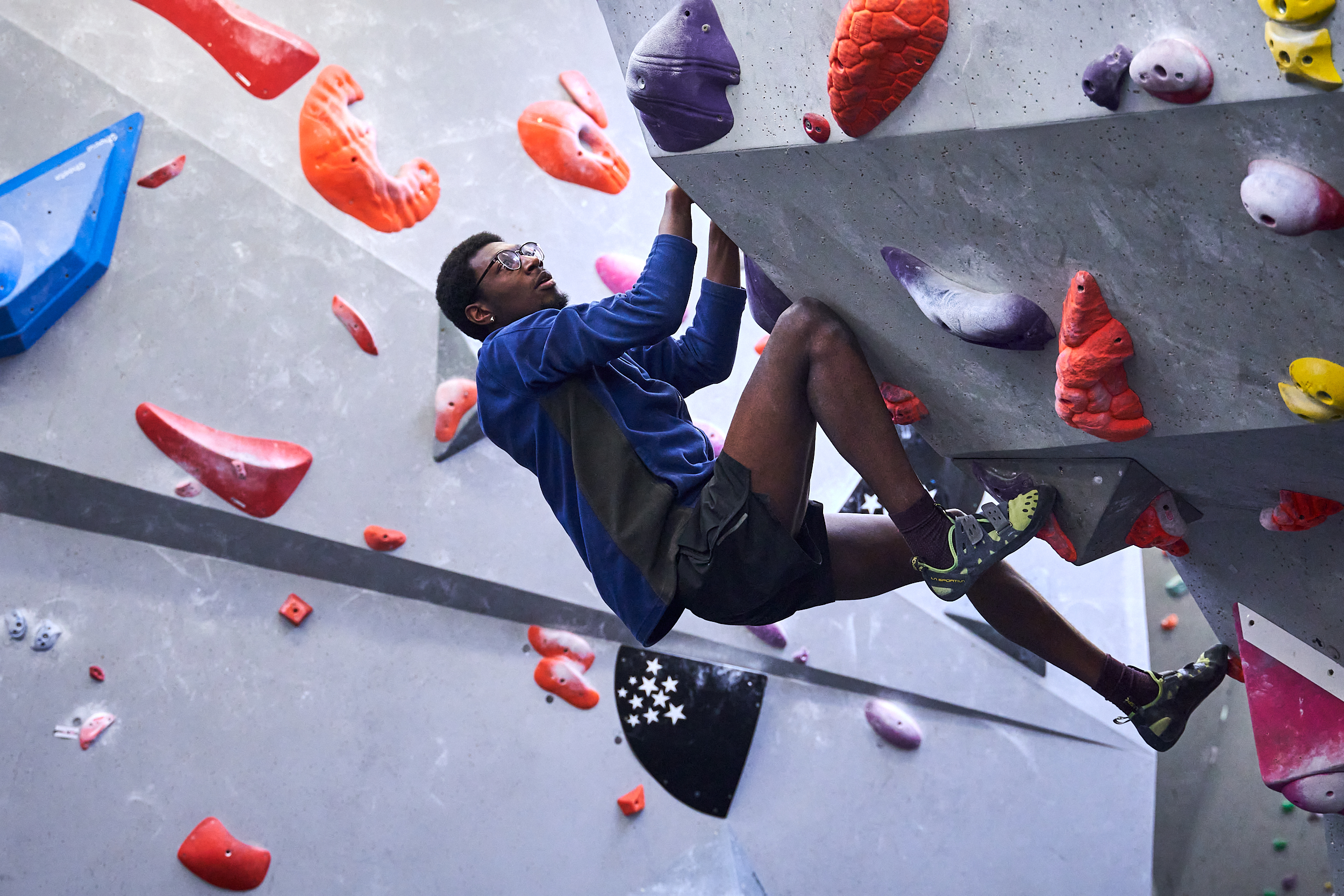 A man on a climbing wall